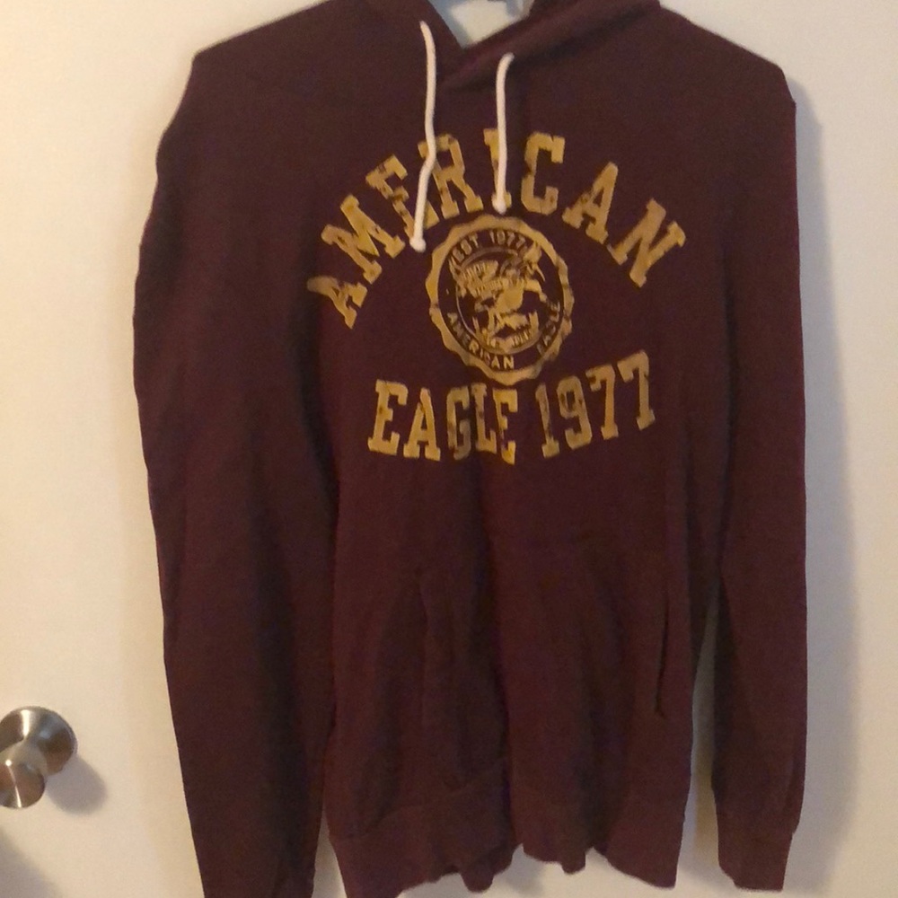 Maroon with yellow writing hoodie
